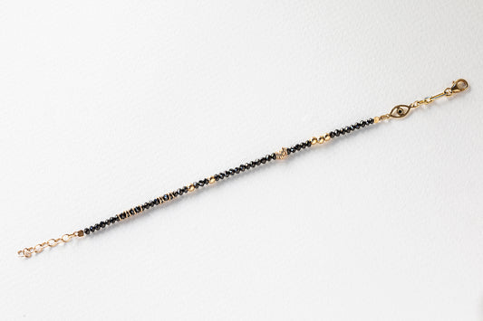 צמיד יהלומים שחורים וזהב