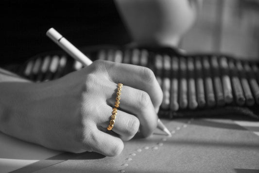 טבעת פרחי זהב עדינה
