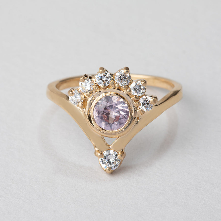 pink sapphire gold ring with a diamond crown