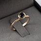 14k gold ring set with a 5mm black diamond
